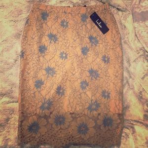 Lulu’s pale pinkish tan and blue flower skirt